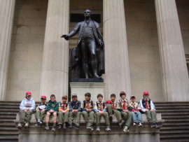 Troop 2295 at the foot of the George Washington statue at the Federal Hall National Memorial on Wall Street.