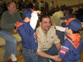 Tiger Leader Avo at center, with event-organizer Bill in background